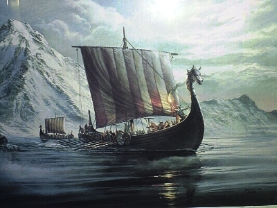 Viking longship sailing through a snowy fjord